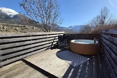 Image de Chalet 75m2  Grande Terrasse Avec Jacuzzi Et Vue Montagne