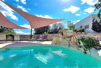 Image de Superbes trulli de campagne avec piscine privée