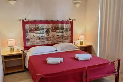 Image de Appartement « Residenze Uliveto - Residenza 10 » avec piscine partagée, terrasse privée et climatisation