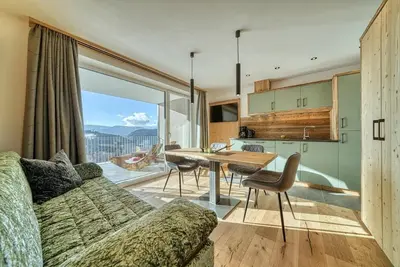Image de Appartement 'Hinterrainerhof - Lodge Silva' avec vue montagne, jardin commun et Wi-Fi