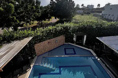 Image de Casa Ama-Gi 2-bedroom apartment in a family house. With communal pool