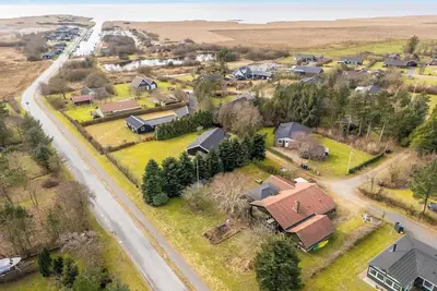 Image de Modernized holiday home with enclosed terrace, near Stauning harbor