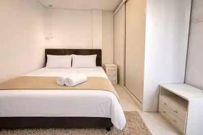 Image de Fully furnished apartment in Meia Praia – Easy access and garage.