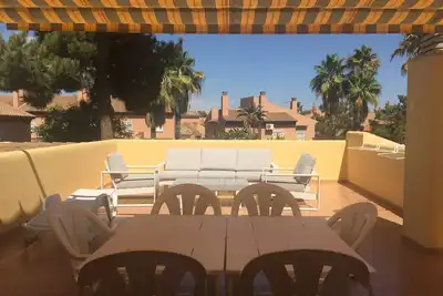 Image de Maison de vacances « Atico En Islantilla » avec piscine partagée, Wi-Fi et climatisation