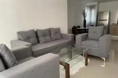 Image de Elegant Modern 3-Bedroom Apartment with Pool & A/C – Ground Floor in Santiago