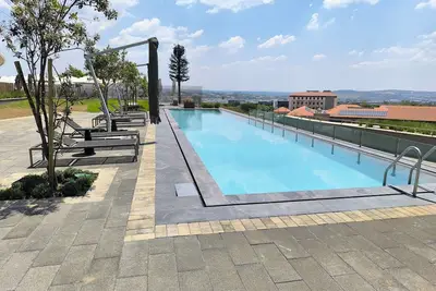 Image de Ellipse Waterfall ~ Power & Water Backup, Free WiFi, next to Mall of Africa