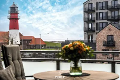 Image de Vacation apartment Waterkant Büsum directly on the beach with sea view over the harbor