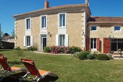 Image de Chambre d’hôtes « La Baritaudière - Suite Kiwi » avec jardin partagé et Wi-Fi