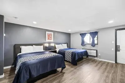 Image de 2 Tranquil Rooms Perfect for Easy Access to the City’s Landmarks & Attraction