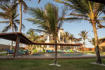 Image de Beach front One Bedroom with Pool and Garden Views