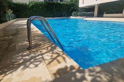 Image de Maison de vacances « Appart - Piscine et Vue sur le Port » avec vue mer, piscine partagée et Wi-Fi