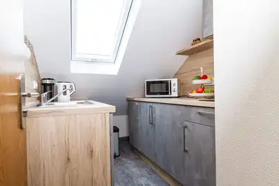 Image de Appartement-Supérieure-Salle de bain privée-Vue sur Jardin-3 Schlafräume