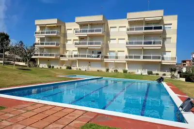 Image de 🏖️ Your perfect summer in Roda de Berà! Pool + Beach + Parking 🚗