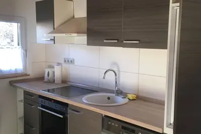 Image de 5 minutes to the center, 5 minutes to the forest, a cozy little apartment