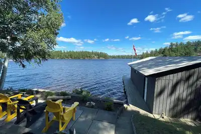 West Arm cottage with panoramic views, boathouse