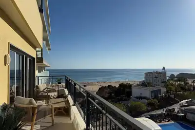 Image de Penthouse idéalement situé avec vue sur mer, Wi-Fi et climatisation à Praia da Rocha