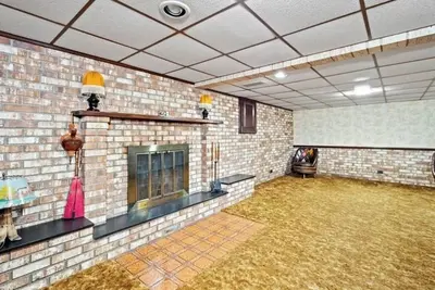 Image de Spacious 4-bedroom house 0. 1 mile from Weirton Medical with Patio and gym