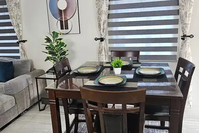 Image de 2-bedroom brand new central townhome in soothing Portmore with air conditioning