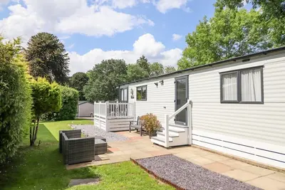 Image de Woodlands Lodge, Bontuchel, Wales. Tv