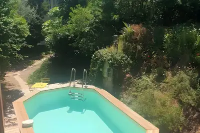 Image de Gite VertCastel - Joli coin de verdure avec piscine et spa