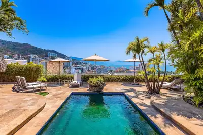 Image de Spectacular hillside villa with pool, incredible views, private chef, & staff