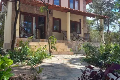 Image de Colibri Chalet in Vale do Capão, Chapada Diamantina, Bahia, with panoramic views.