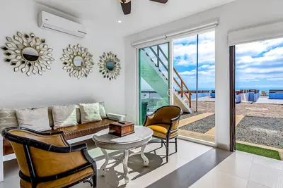 Dog-friendly ocean-view retreat with pool access plus rooftop deck, Ac