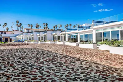 Dog-friendly home 3 rows to beach with rooftop deck, pool, & kitchen