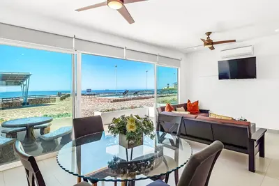 Dog-friendly oceanfront villa with pool access, rooftop patio, full kitchen