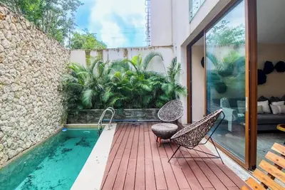 Image de 3-story condo with private plunge pool, balcony, exercise room, and Ac