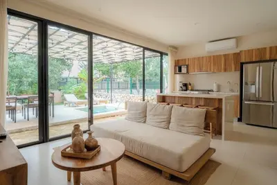 Image de Sun-soaked & modern beach getaway with pool, generous patio, gym, & great views