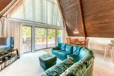 Image de Charming, lakefront A-frame with private dock, lakeside gazebo, spacious deck