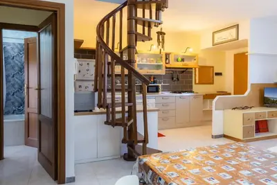 Image de A charming 70 square meters apartment, perfect for six people, located on the first floor of a renovated terraced building (no elevator). The property is located in Olmedo, a small town in northwestern Sardinia, nestled inland between Alghero and