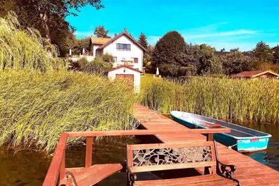 Image de Appartement de vacances – Maison au bord du lac