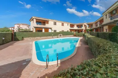 Image de Appartement « Casa Vacanze Mirtillo » avec piscine partagée, terrasse privée et climatisation