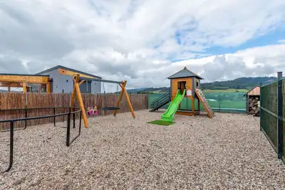 Image de Appartement dans une maison de vacances avec bain à remous, climatisation, Wifi, Tv, terrasse