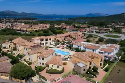 Image de Appartement 'Casa Vacanze Maracuja' avec piscine partagée, terrasse et climatisation
