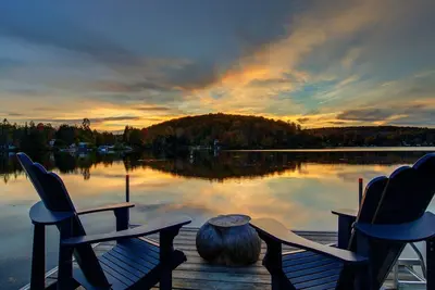 Image de Chalet bord du lac avec spa et coucher de soleil