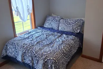 Image de Country Coastal is a renovated and spacious farmhouse with coastal charm.