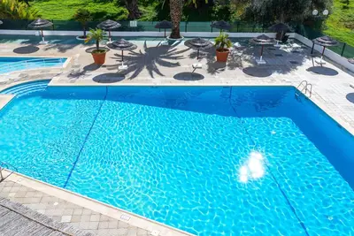 Image de #319 Cozy 1 Bedroom Apartment | Pool & Relaxation