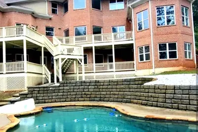 Image de The Sandy Shores Estate Heated Pool, Hot Tub, Theater & Game Lounge