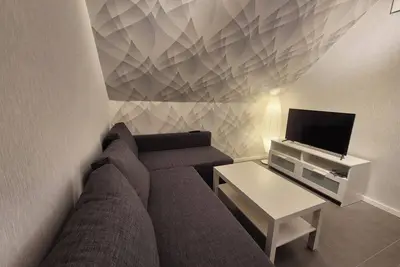 Image de FeWo Luise, modern comfort apartment: completely renovated, eat-in kitchen & underfloor heating.