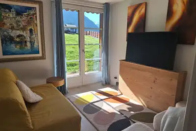Image de Appartement « Au Pied Des Pistes - Petit Châtel » avec vue montagne, terrasse privée et Wi-Fi