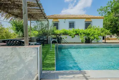 Image de Villa « Rancho Jardines De Marchenilla » avec piscine privée, Wi-Fi et climatisation