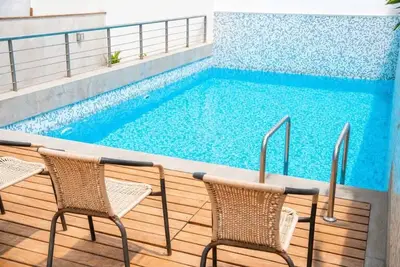 Image de Urbano Plus 1504 · Bello 2br para 8 | Vista Circuito Magico + Piscina