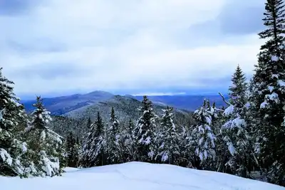 Image de Cozy mountain condo on family run ski resort, hiking, biking and more. Pets Ok