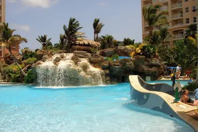 Image de Oceanview-Relaxing 2-bedroom resort. River pool. Walk to restaurants.