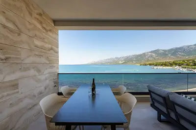 Image de Exclusive 4**** penthouse apartment directly by the sea, with 100sqm roof terrace.