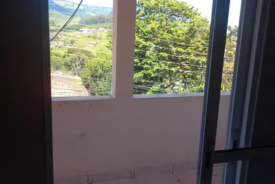 Image de Cozy loft, close to the market, paved road to waterfalls in the city center.