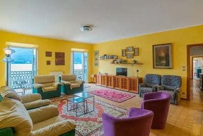 Image de Charming 170 sqm apartment, perfect for 6 people, located on the second floor of a building with an elevator (not wheelchair accessible). The property is located in the heart of Dongo (in the restricted traffic zone), a renowned town on the western shore